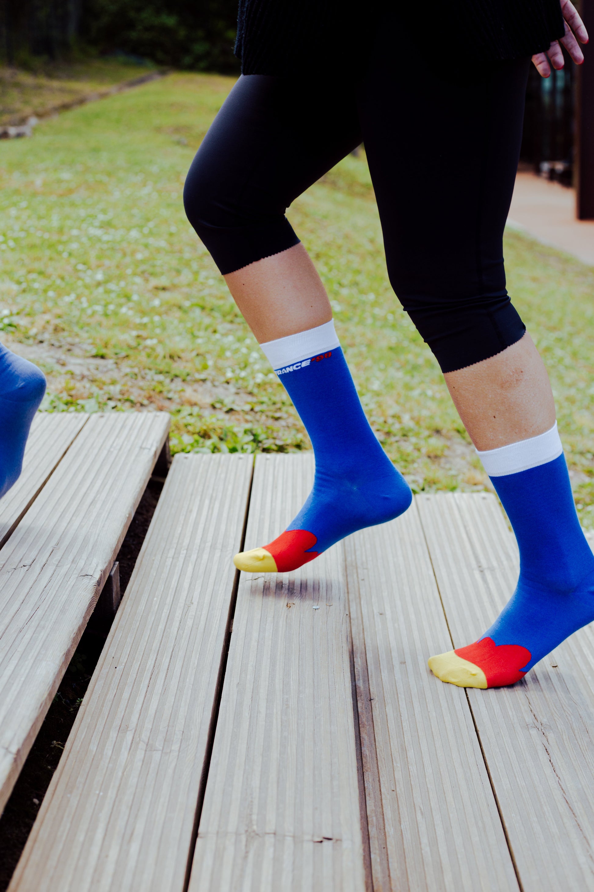 Limited edition memoraball socks celebrating the 1998 World Cup in France with blue, white and red French flag colors and Footix mascot