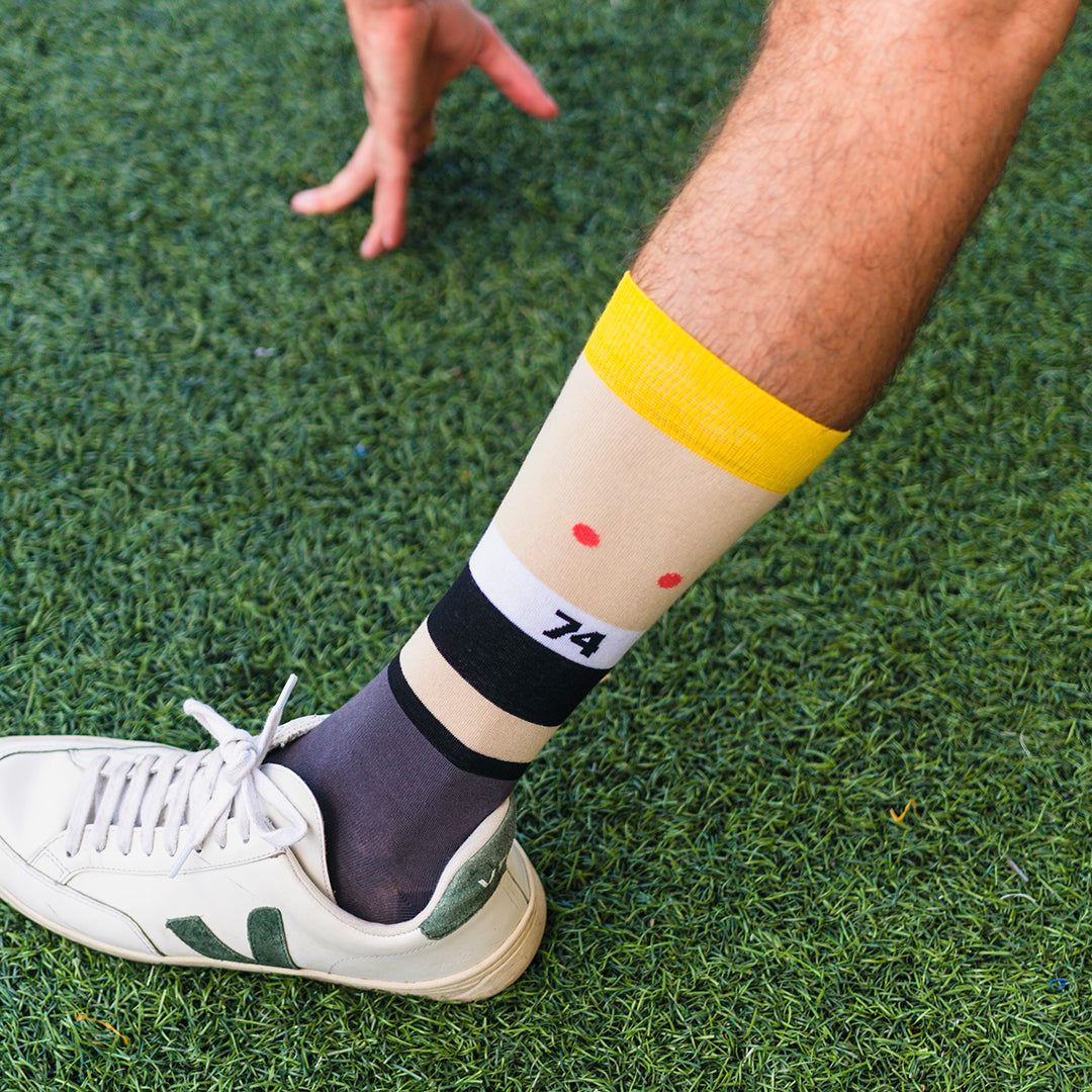 memoraball football socks celebrating the 1974 World Cup in Germany with black, German colors and Tip and Tap mascots